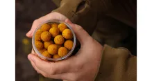 NIKL Rozpustné Criticals boilie Corn 250ml (9)